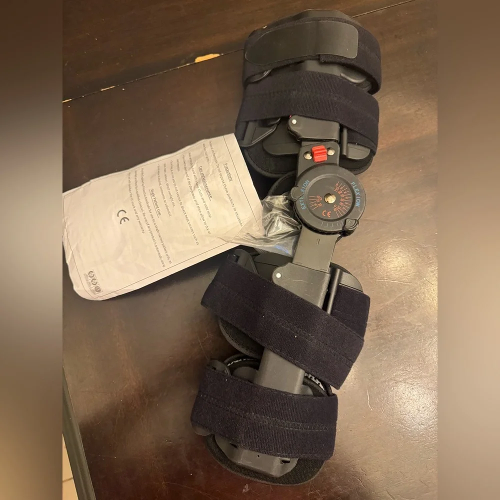 Adjustable Black Hinged Knee Brace with ROM Dial Support